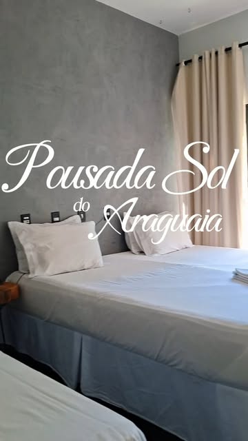 Quarto da pousada com duas camas